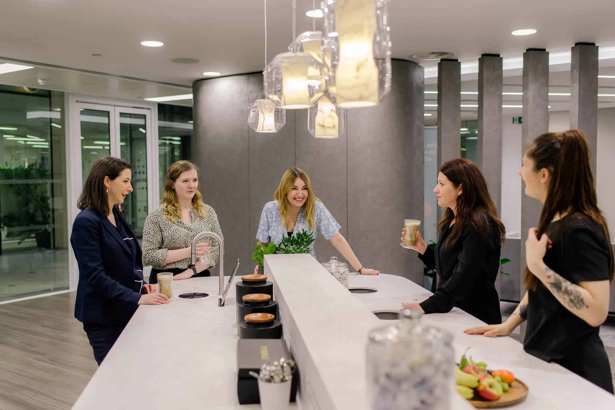 AmTrust offices, colleagues enjoying a TopBrewer coffee