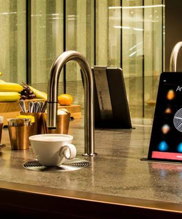 QBE Brokers Lounge featuring the TopBrewer Coffee Machine serving an Americano